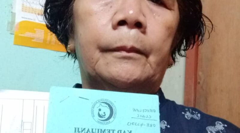 Mebpung shows her appointment card for cancer treatment. — THE LAND OF BORNEO